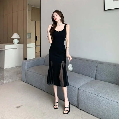 Elegant Black Midi Dress – Sleeveless Fit & Flare with Sheer Mesh Inserts