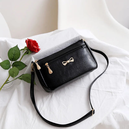 Black Textured Handbag with Metal Handle