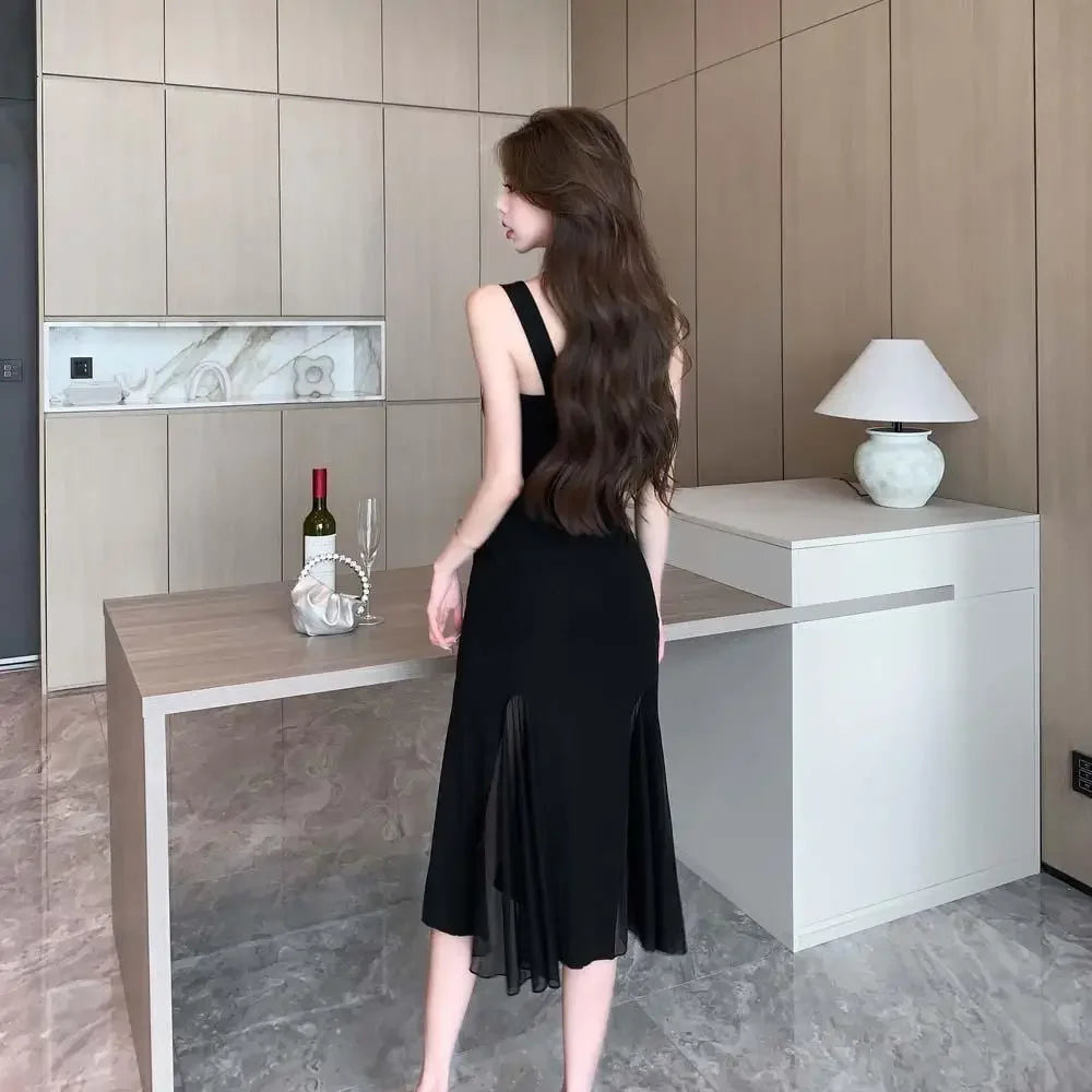 Elegant Black Midi Dress – Sleeveless Fit & Flare with Sheer Mesh Inserts