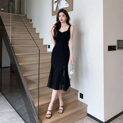 Elegant Black Midi Dress – Sleeveless Fit & Flare with Sheer Mesh Inserts