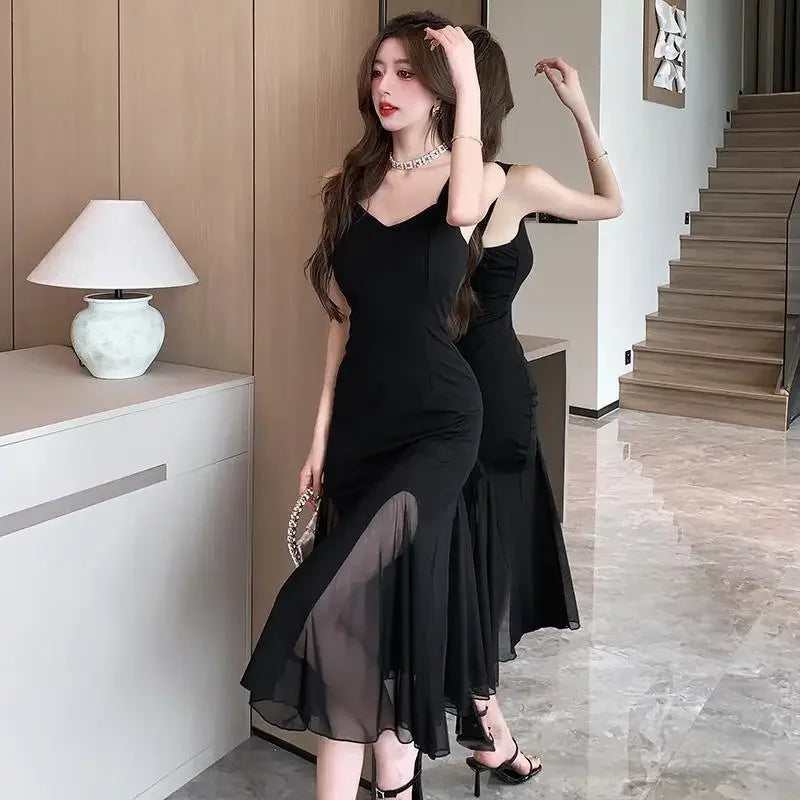 Elegant Black Midi Dress – Sleeveless Fit & Flare with Sheer Mesh Inserts